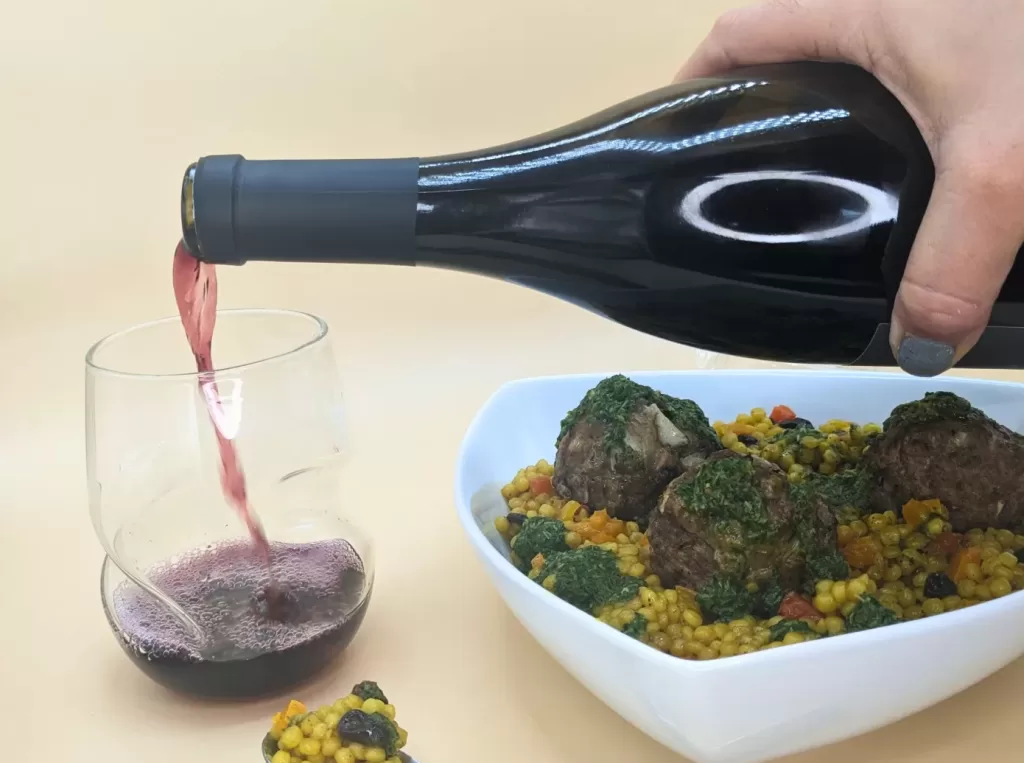 wine next to the Lamb Meatballs with Moroccan Couscous