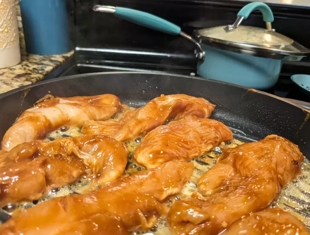 grilling chicken on skillet