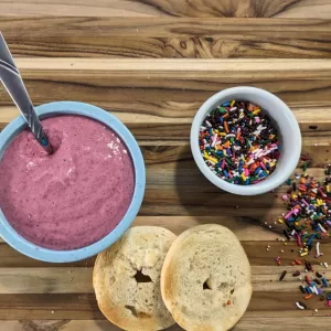 Breakfast, beet spread, vibrant, nutritious, healthy recipe, bagels, homemade, morning routine, colorful, nutrient-rich, dip, toast, breakfast bowl, beet recipe, food photography, wholesome, fresh ingredients, beetroot spread, health food, homemade spread, playful, sprinkles, breakfast delight